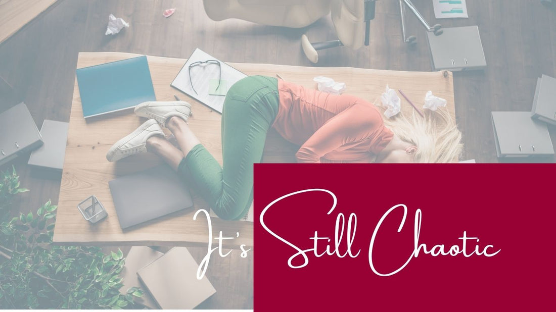 woman lying on table surrounded by mess