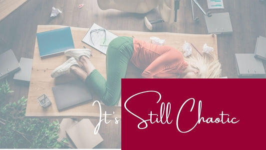 woman lying on table surrounded by mess